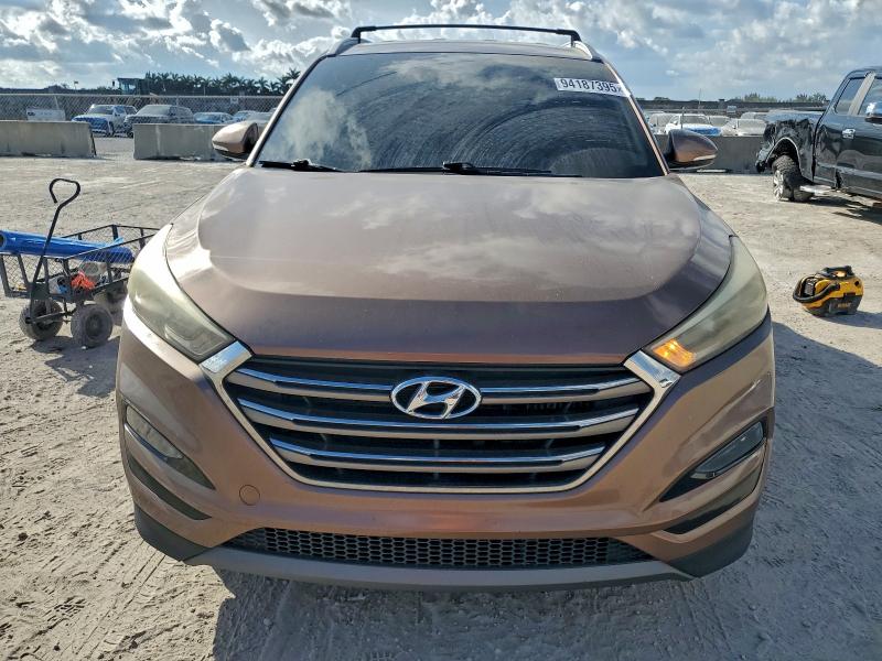 Photo 5 from auction – 2014 HYUNDAI TUCSON with VIN KM8J33A28GU252624