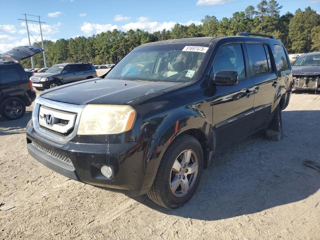 HONDA PILOT EXL 2011 with VIN 5FNYF3H6XBB047374 - Photo from auction