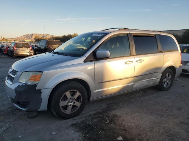DODGE GRAND CARA 2010 with VIN 2D4RN5D19AR229733 - Photo from auction