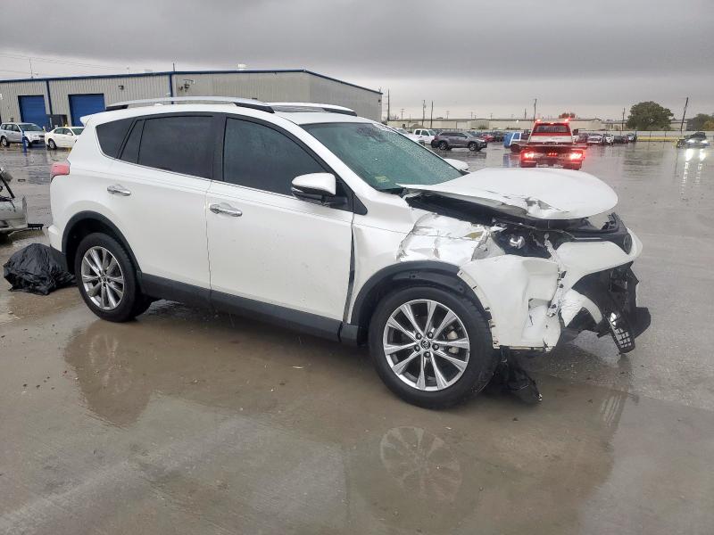 Photo 4 from auction – 2016 TOYOTA RAV4 LIMIT with VIN 2T3YFREV9GW264320