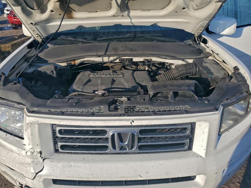 Photo 11 from auction – 2006 HONDA RIDGELINE with VIN 2HJYK16556H535430