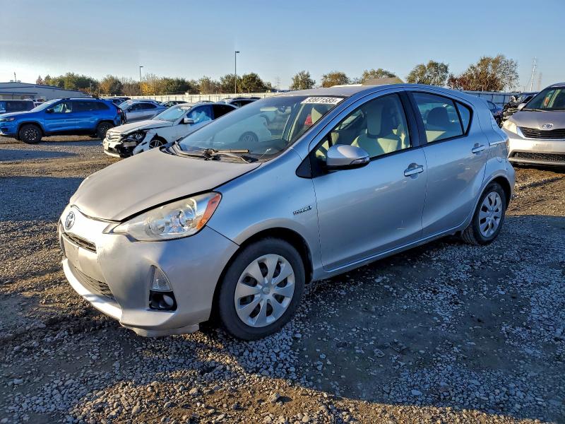 TOYOTA PRIUS C 2014 with VIN JTDKDTB34E1572390 - Photo from auction