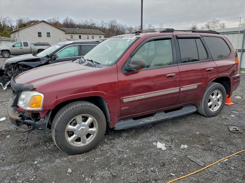 GMC ENVOY 2005 with VIN 1GKDT13SX52319899 - Photo from auction