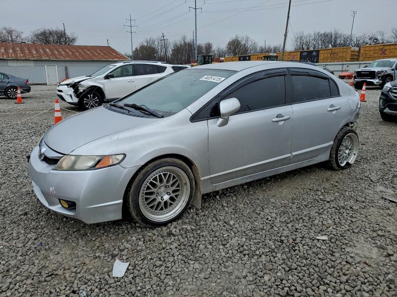 HONDA CIVIC LX 2011 with VIN 19XFA1F57BE038044 - Photo from auction