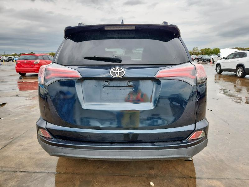 Photo 6 from auction – 2017 TOYOTA RAV4 LE with VIN JTMZFREV3HJ131704