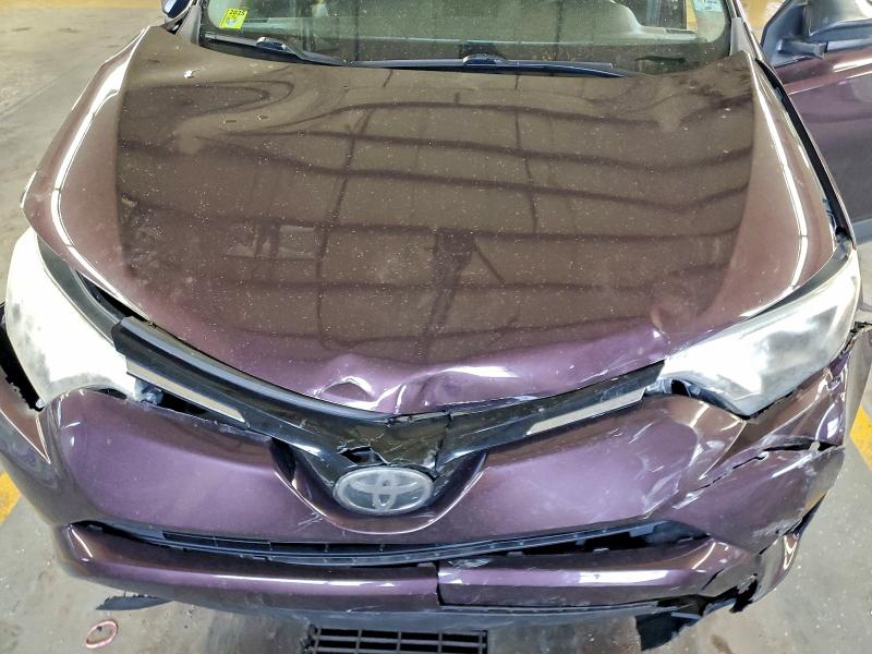 Photo 12 from auction – 2018 TOYOTA RAV4 LE with VIN 2T3BFREV2JW703581