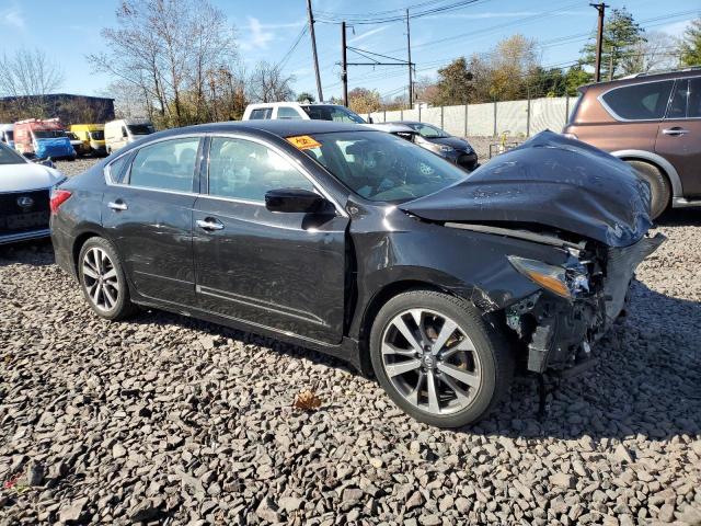 Photo 4 from auction – 2016 NISSAN ALTIMA 2.5 with VIN 1N4AL3AP9GC178500