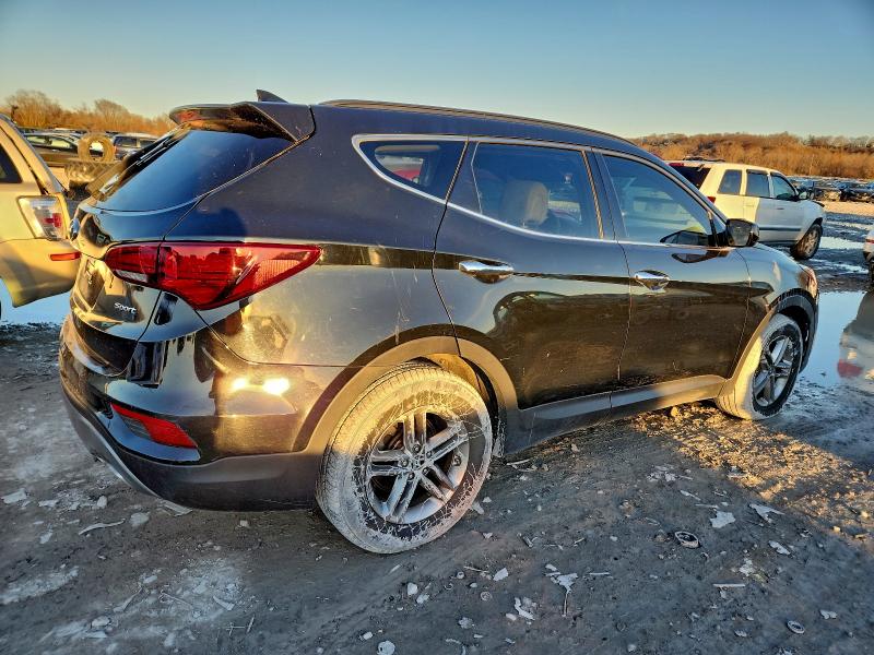 Photo 3 from auction – 2017 HYUNDAI SANTA FE S with VIN 5NMZU3LB7HH022504