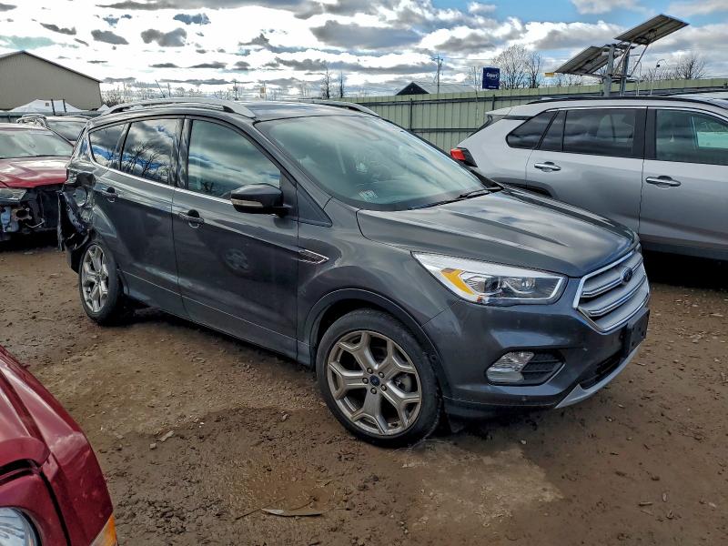 Photo 4 from auction – 2019 FORD ESCAPE TIT with VIN 1FMCU9J98KUC10372