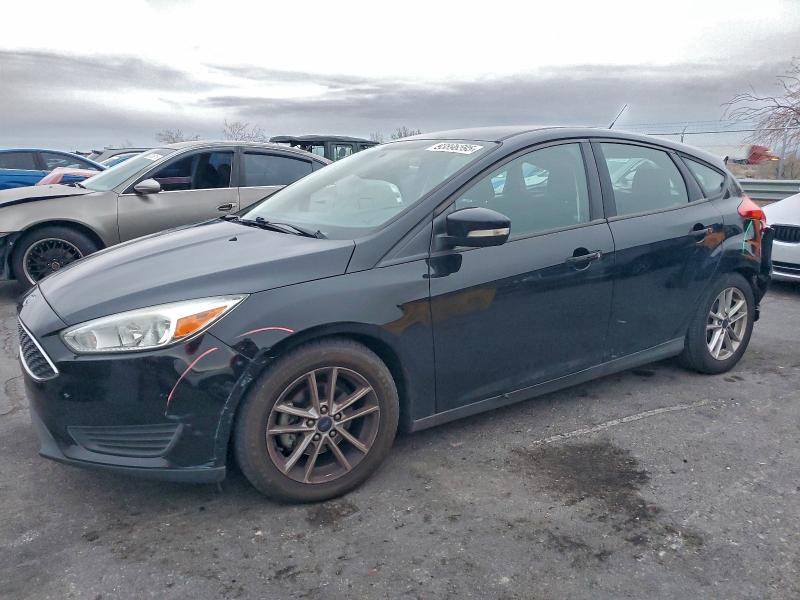 FORD FOCUS SE 2016 with VIN 1FADP3K29GL344745 - Photo from auction