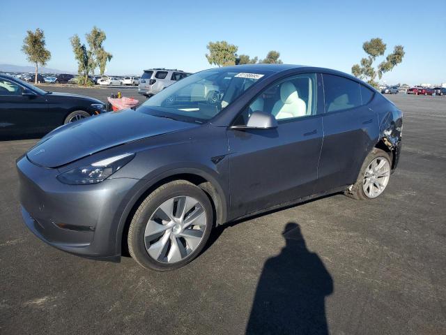 TESLA MODEL Y 2023 with VIN 7SAYGDED4PF978422 - Photo from auction