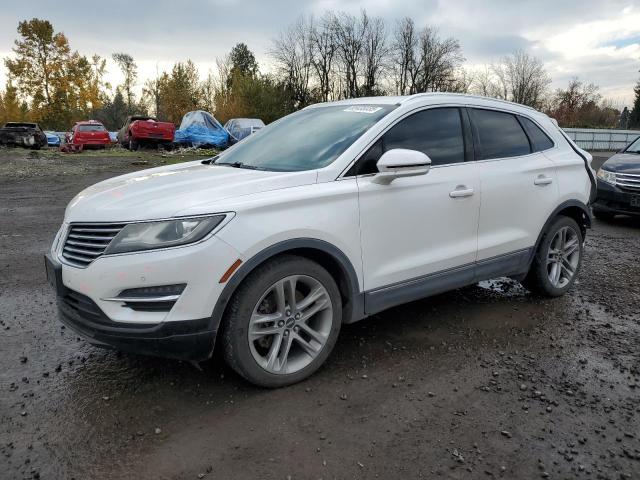 LINCOLN MKC 2015 with VIN 5LMTJ2AH1FUJ05599 - Photo from auction