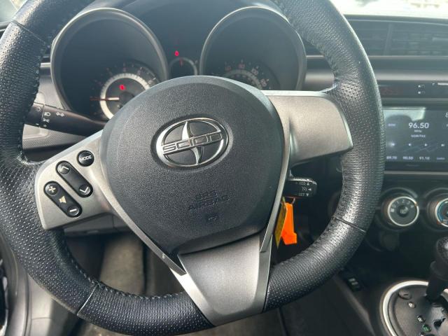Photo 12 from auction – 2011 TOYOTA SCION TC with VIN JTKJF5C75B3001020
