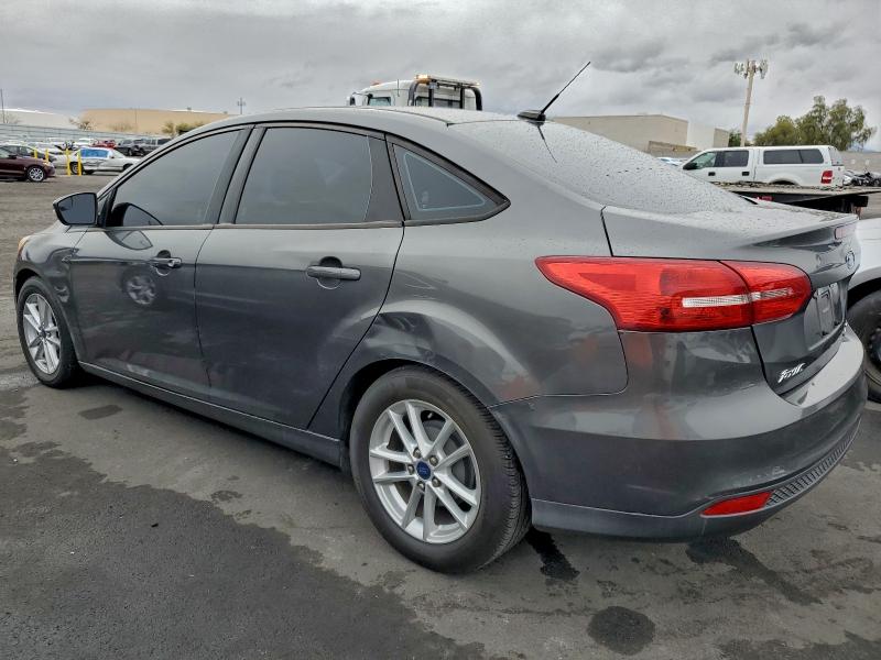 Photo 2 from auction – 2015 FORD FOCUS SE with VIN 1FADP3F21FL205363