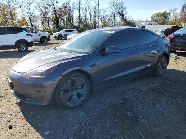 TESLA MODEL 3 2023 with VIN 5YJ3E1EB5PF634530 - Photo from auction