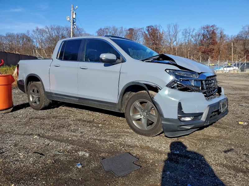 Photo 4 from auction – 2023 HONDA RIDGELINE with VIN 5FPYK3F59PB022874
