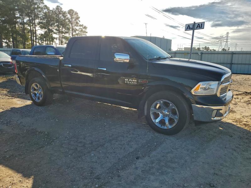 Photo 4 from auction – 2015 RAM 1500 LARAM with VIN 1C6RR7VMXFS575471