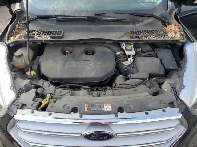 Photo 11 from auction – 2018 FORD ESCAPE TIT with VIN 1FMCU9J95JUA38929