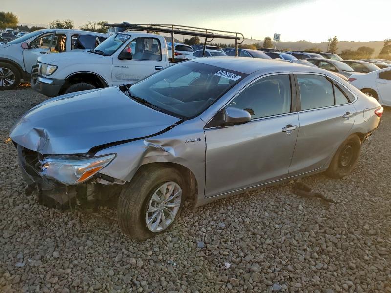 TOYOTA CAMRY HYBR 2016 with VIN 4T1BD1FK6GU199677 - Photo from auction
