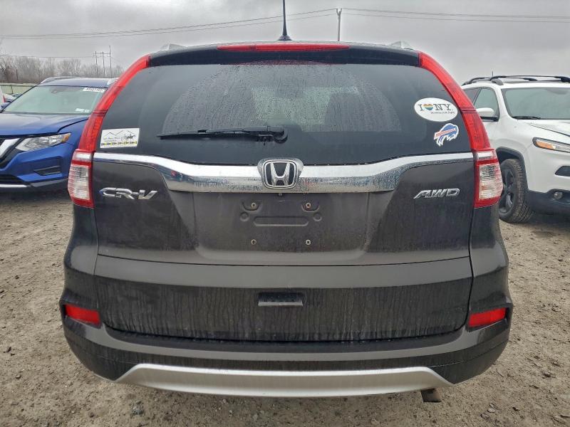 Photo 6 from auction – 2016 HONDA CR-V EXL with VIN 2HKRM4H73GH683233