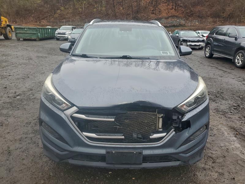 Photo 5 from auction – 2017 HYUNDAI TUCSON LIM with VIN KM8J3CA41HU445295