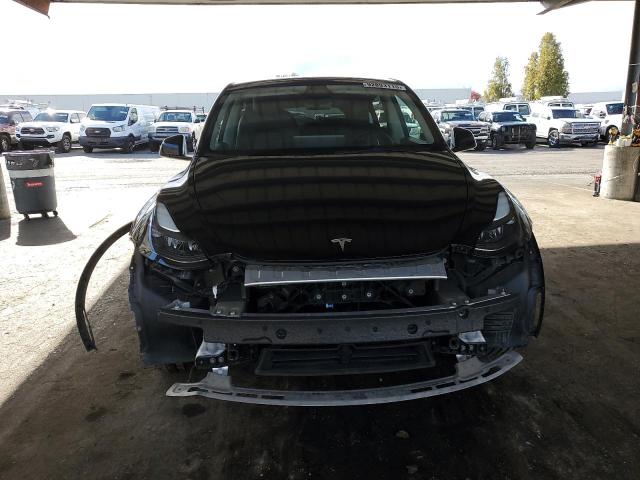 Photo 5 from auction – 2023 TESLA MODEL Y with VIN 7SAYGAEE5PF900917