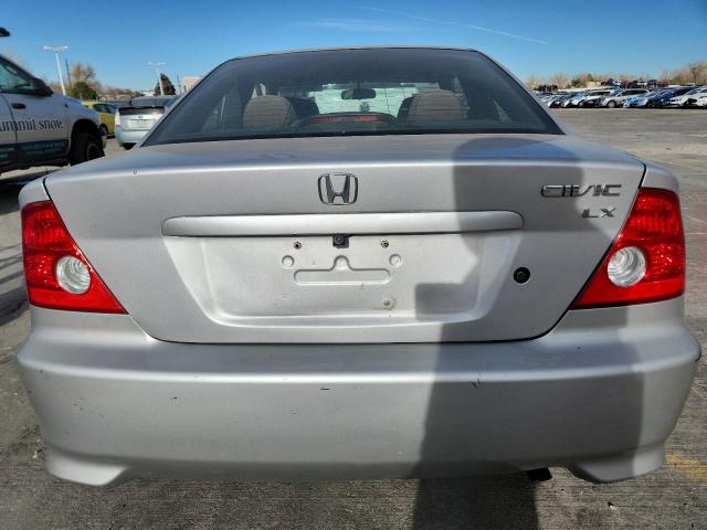Photo 6 from auction – 2004 HONDA CIVIC LX with VIN 1HGEM22544L063574