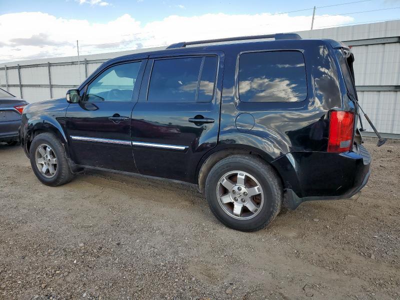 Photo 2 from auction – 2011 HONDA PILOT TOUR with VIN 5FNYF3H91BB033258