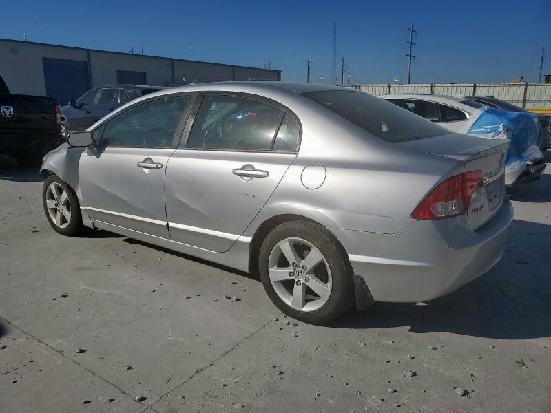 Photo 2 from auction – 2010 HONDA CIVIC LX-S with VIN 19XFA1F62AE025953