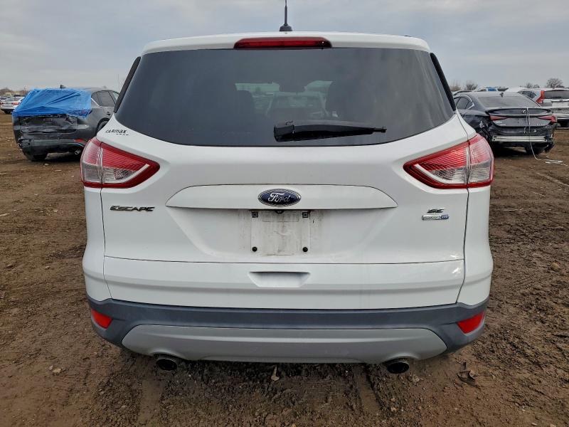 Photo 6 from auction – 2016 FORD ESCAPE SE with VIN 1FMCU9GX0GUC76749
