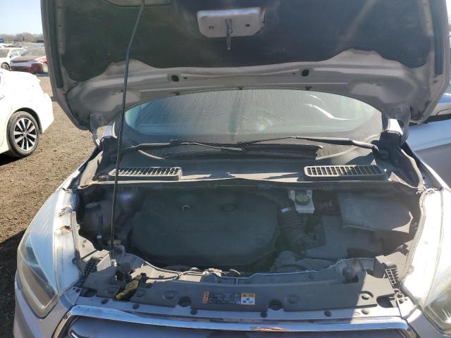 Photo 12 from auction – 2018 FORD ESCAPE with VIN 1FMCU9J9XJUA18627