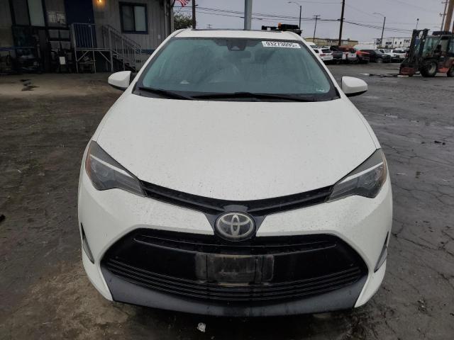 Photo 5 from auction – 2017 TOYOTA COROLLA LE with VIN 5YFBPRHE7HP588067