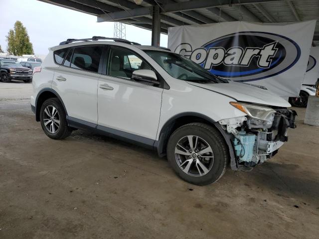 Photo 4 from auction – 2017 TOYOTA RAV4 XLE with VIN JTMRFREV9HJ710311