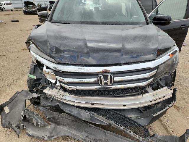 Photo 12 from auction – 2016 HONDA PILOT EXL with VIN 5FNYF6H86GB097053