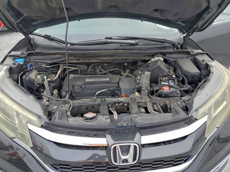 Photo 12 from auction – 2015 HONDA CR-V with VIN 5J6RM4H71FL060004