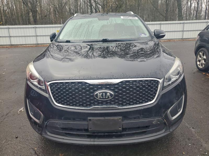 Photo 5 from auction – 2016 KIA SORENTO LX with VIN 5XYPGDA31GG022930