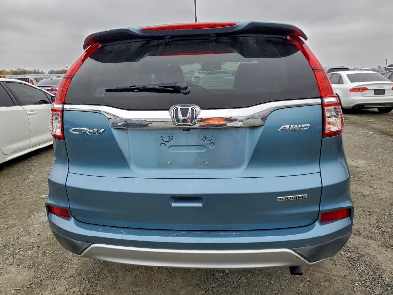 Photo 6 from auction – 2015 HONDA CR-V with VIN 5J6RM4H96FL047590
