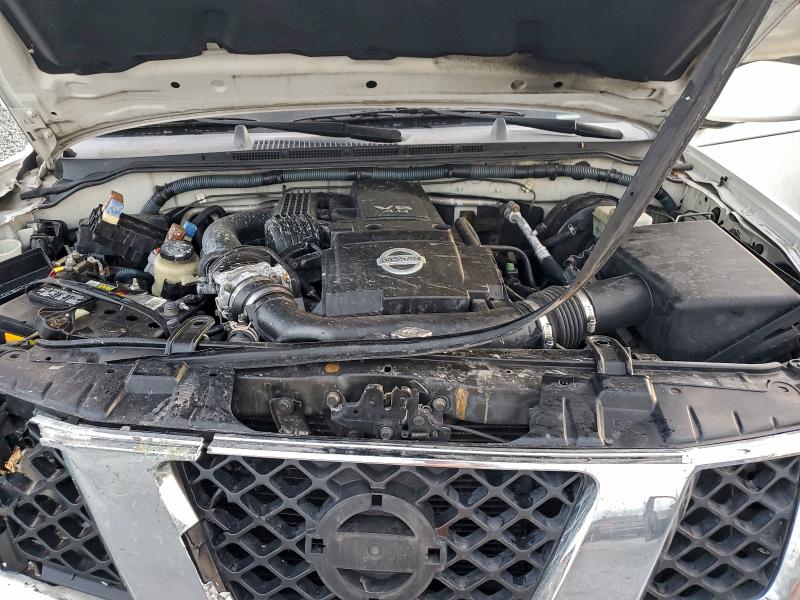 Photo 11 from auction – 2006 NISSAN FRONTIER C with VIN 1N6AD07U46C461014