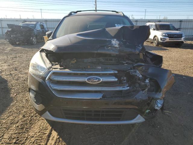 Photo 5 from auction – 2017 FORD ESCAPE SE with VIN 1FMCU9GD0HUA00384