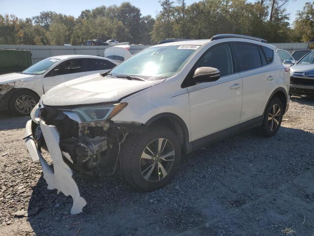 TOYOTA RAV4 XLE 2017 with VIN JTMWFREV7HJ702274 - Photo from auction