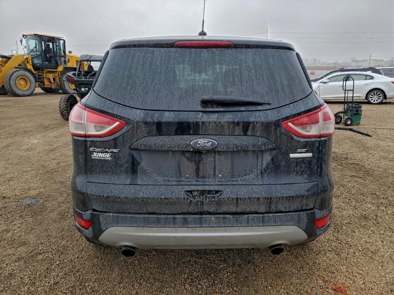 Photo 6 from auction – 2016 FORD ESCAPE SE with VIN 1FMCU0GX8GUC11465