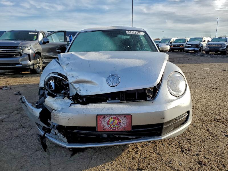 Photo 5 from auction – 2013 VOLKSWAGEN BEETLE with VIN 3VWJP7AT7DM660585