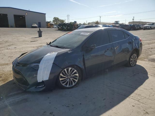 TOYOTA COROLLA LE 2017 with VIN 5YFBPRHEXHP694318 - Photo from auction