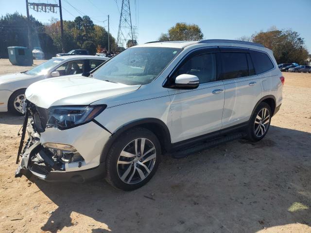 Photo 1 from auction – 2017 HONDA PILOT TOUR with VIN 5FNYF5H97HB039487