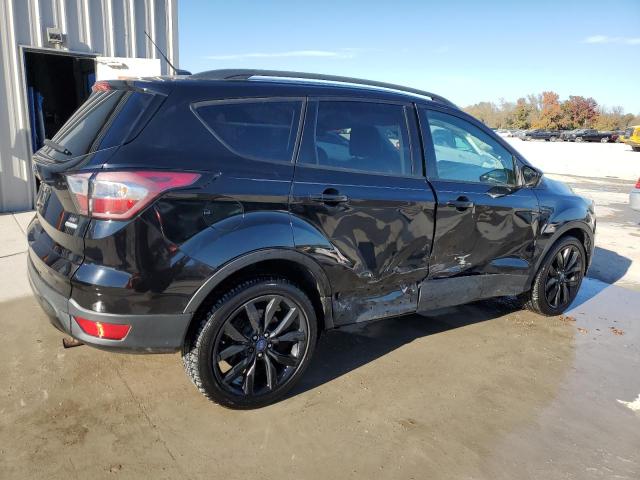 Foto 3 de la subasta – 2017 FORD ESCAPE SE con VIN 1FMCU0GD4HUE23609