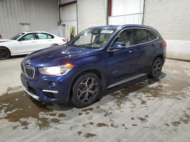 BMW X1 XDRIVE2 2016 with VIN WBXHT3C35G5E52899 - Photo from auction