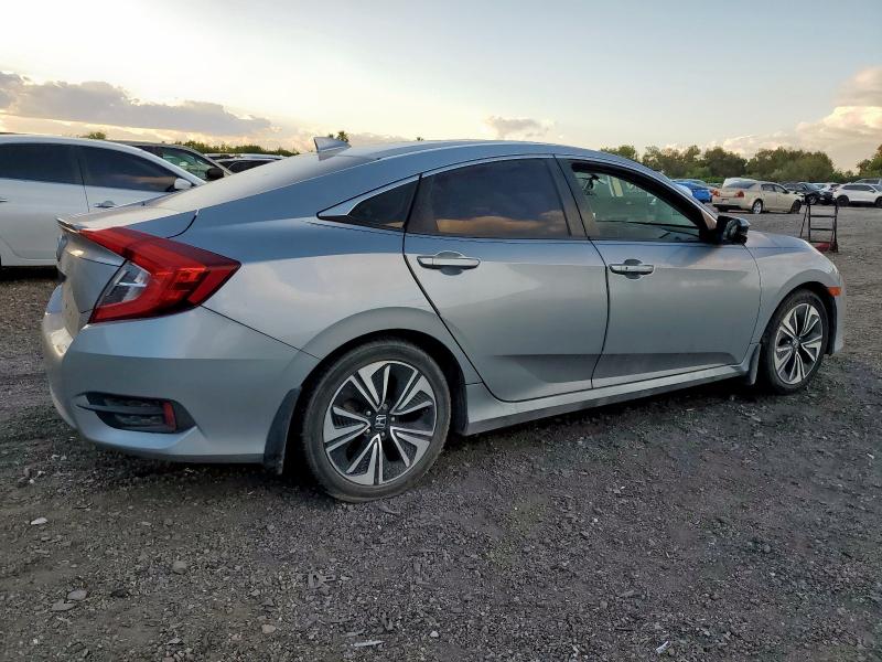 Photo 3 from auction – 2016 HONDA CIVIC with VIN 19XFC1F39GE031774