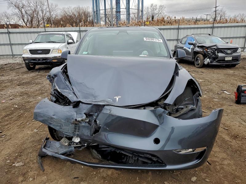 Photo 5 from auction – 2023 TESLA MODEL Y with VIN 7SAYGAEE9PF750911