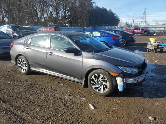 Photo 4 from auction – 2018 HONDA CIVIC LX with VIN 2HGFC2F64JH028410