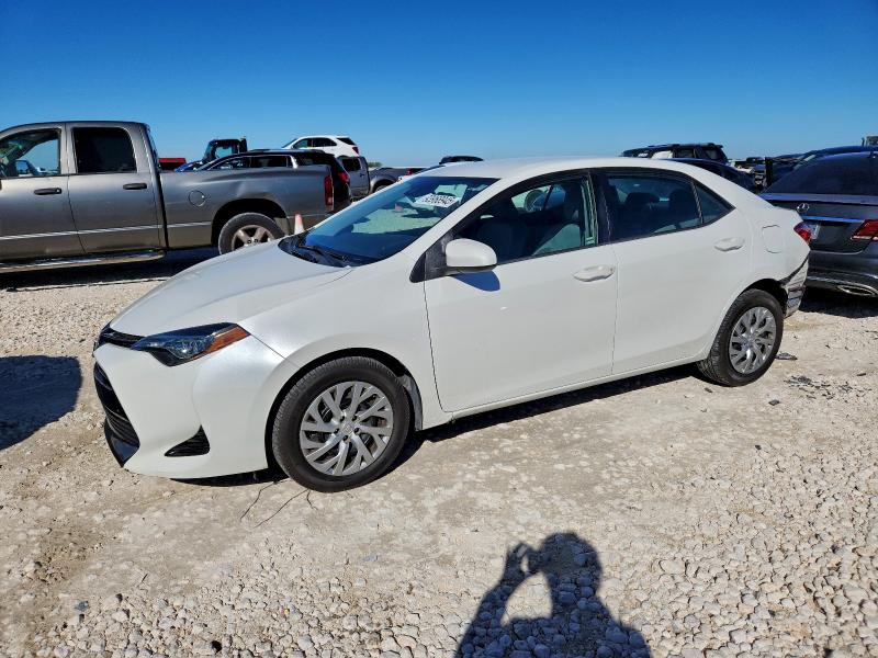 TOYOTA COROLLA L 2018 with VIN 5YFBURHE4JP828643 - Photo from auction